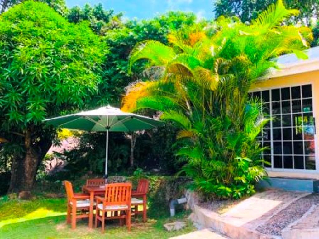 Appartement The Reef Palm à Anse aux Pins Extérieur photo